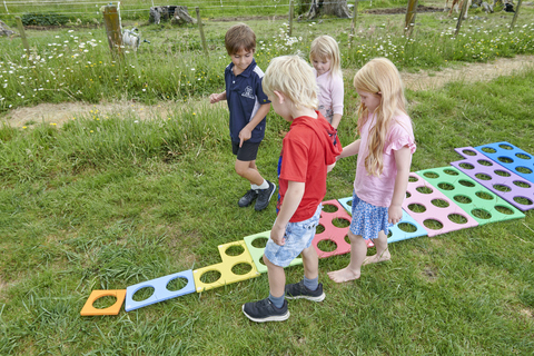 Children solving maths problems with Numicon